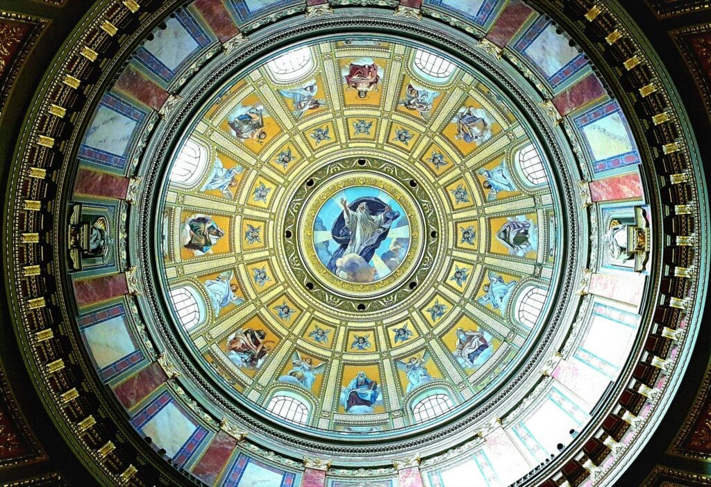 Stunning view of the ornate dome ceiling in St. Stephen's Basilica, Budapest. Rich in religious art.