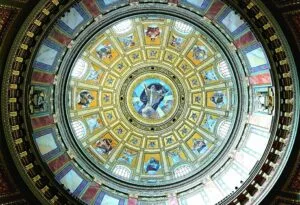 Stunning view of the ornate dome ceiling in St. Stephen's Basilica, Budapest. Rich in religious art.